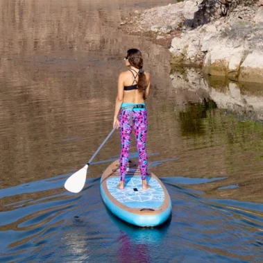 Solo paddle boarder navigating Lake Mead's clear waters