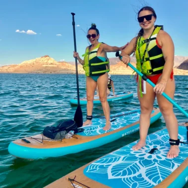 Paddle boarders approaching Boulder Island's shoreline